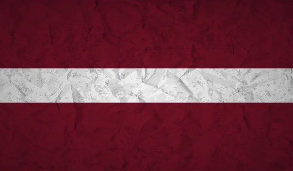 Drapeau de la Lettonie avec l'effet de papier froissé et grunge — Image vectorielle