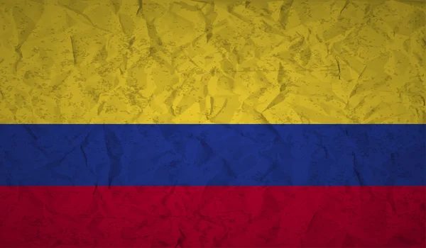 Columbia vlag met het effect van verfrommeld papier en grunge — Stockvector