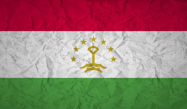 Vlajka Tádžikistánu s efektem zmačkaný papír a grunge — Stockový vektor