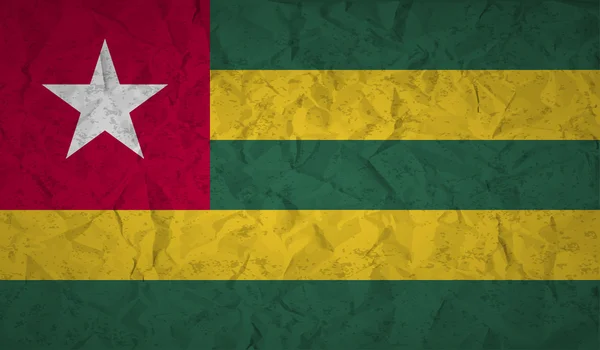 Bandera de Togo con el efecto de papel arrugado y grunge — Vector de stock