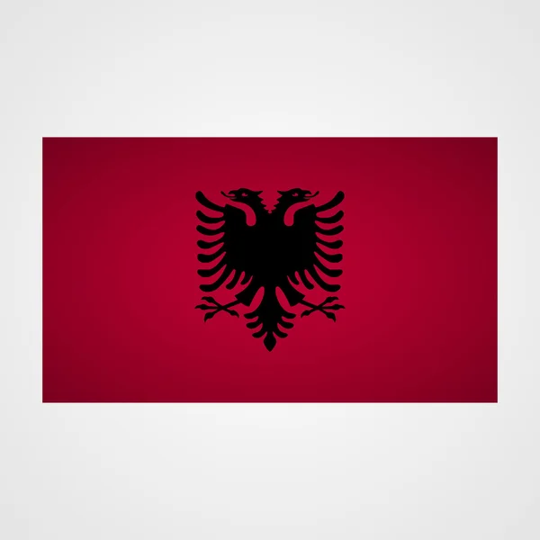 Albaniens flagga på en grå bakgrund. Vektor illustration — Stock vektor