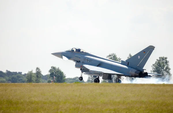 German eurofighter typhoon lands on airport Stock Picture