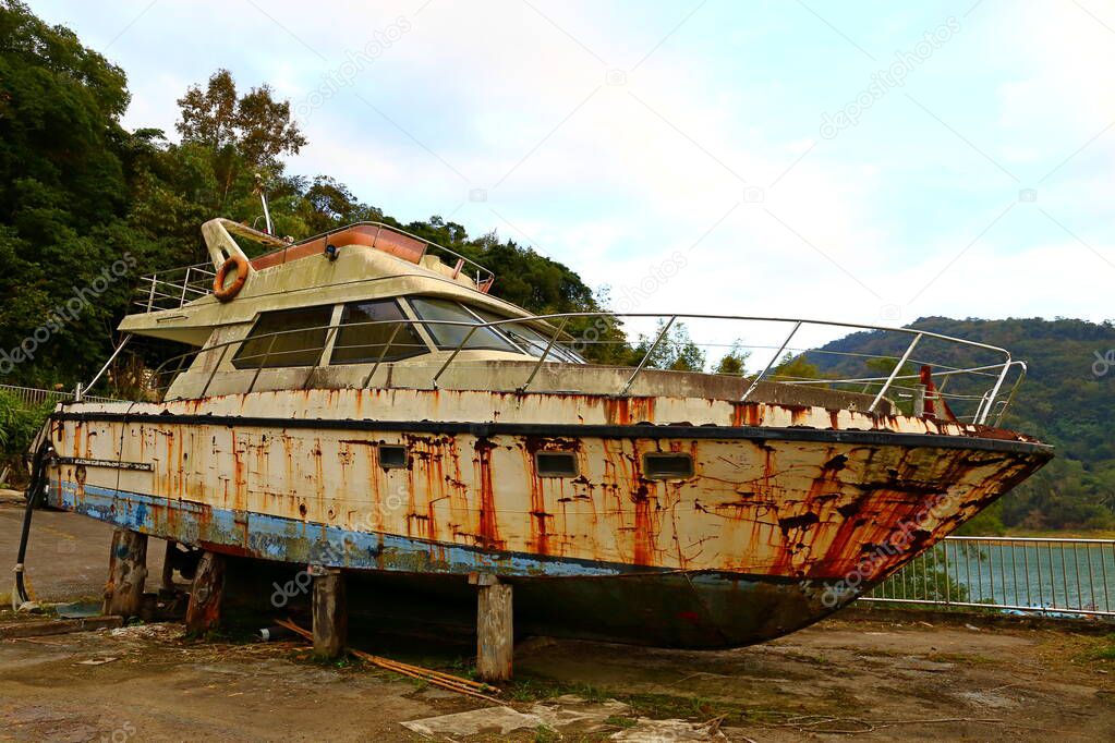 Abandoned Boat at Shimen Reservoir, one of the main reservoirs in Taoyuan City northern Taiwan,
