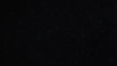 İzole bulut siyah arka plan kabarcık Bokeh toz