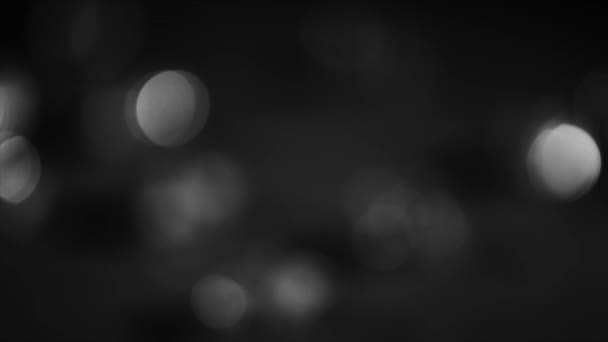 4K constante de enfoque circular Bokeh blanco y negro — Vídeo de stock