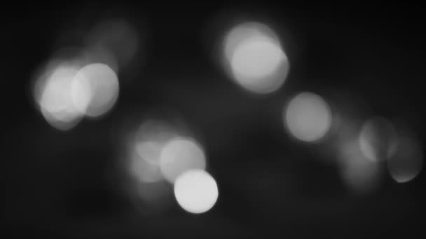 4K Steady Of Focus Circular Bokeh Black and White — Stock Video