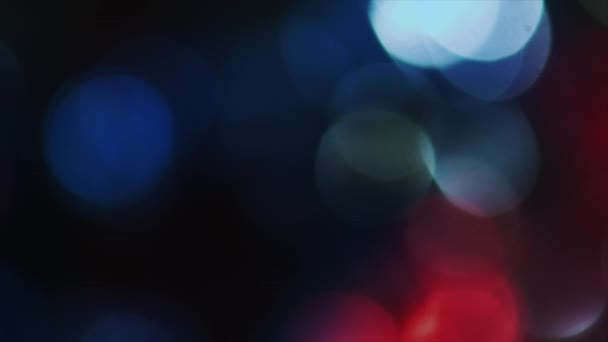 4k wackelig des Fokus kreisförmige Bokeh rot und blau — Stockvideo