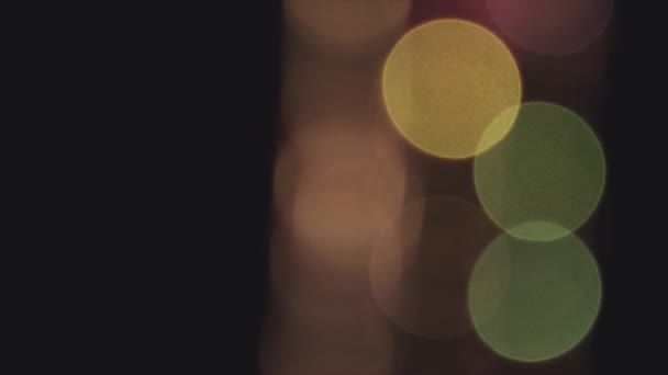 4 k 초점 원형 Bokeh 노란색과 녹색의 흔들리는 — 비디오
