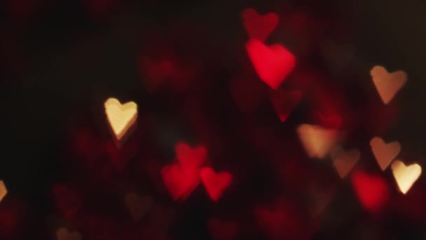 4K Distant Out Of Focus Heart Bokeh Red — Stock Video