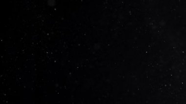 İzole bulut siyah arka plan kabarcık Bokeh toz