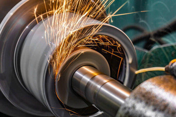 Internal grinding of a part on a cylindrical grinding machine.