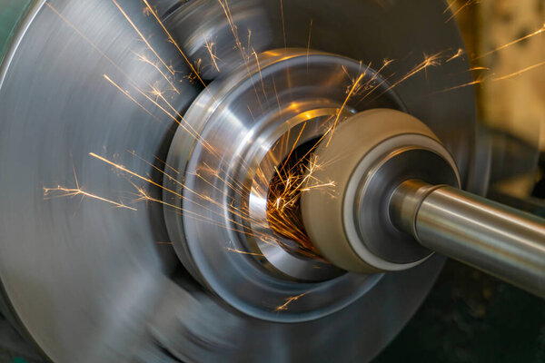 High-precision finishing of the part by grinding with a face abrasive wheel on a cylindrical grinding machine.