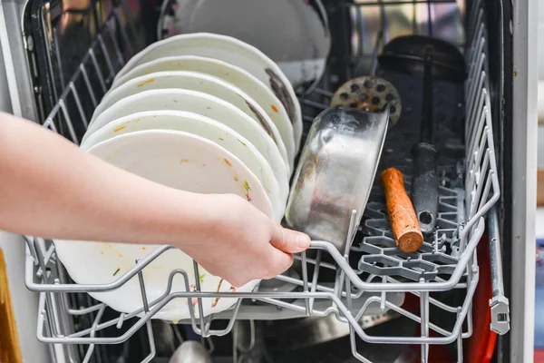 Girl Opens Dishwasher Load Dirty Dishes — Stock Photo, Image