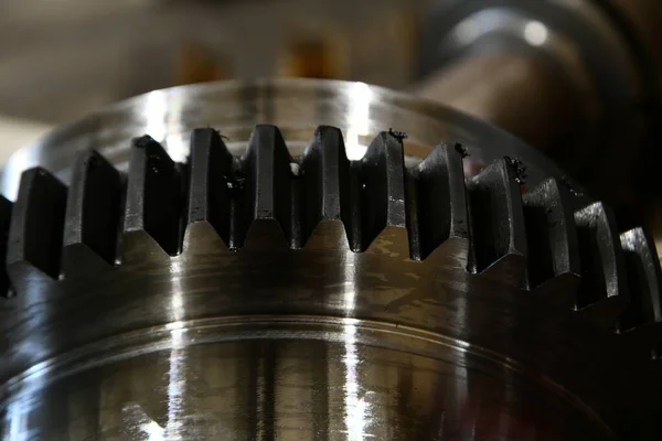 A cog wheel made on a hobbing machine close-up.