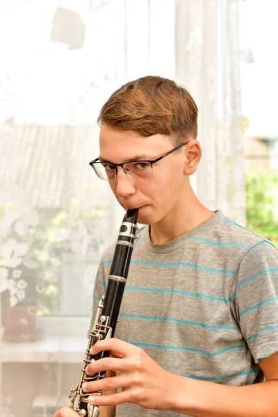 Boy Glasses Plays Clarinet Music School — Zdjęcie stockowe