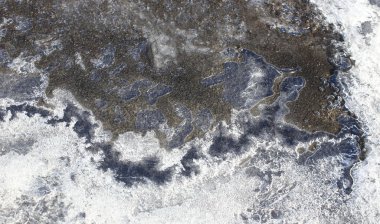 Buz ve baloncuklar üzerine sığ bir w büyüleyici harita gibi yapısı