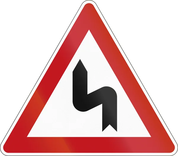 Panneau allemand avertissant d'une courbe gauche — Photo