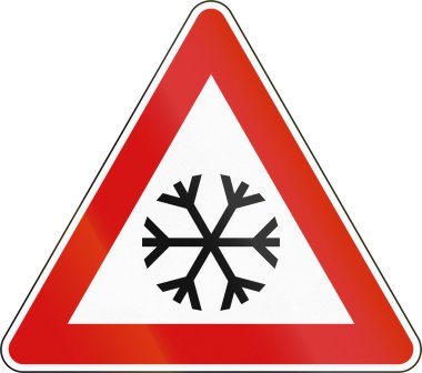 Sloven yol uyarı işaret - buzlu devam