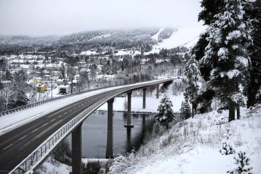 View over the beam bridge Angermannabron in Solleftea, Sweden. clipart