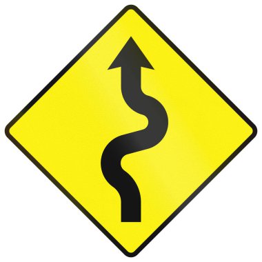 Uyarı levhası İrlanda 'da kullanılır - İleride keskin virajlar serisi, ilk sola.