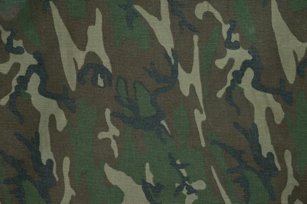 Primer plano de la superficie uniforme militar, patrón de camuflaje textil —  Fotos de Stock
