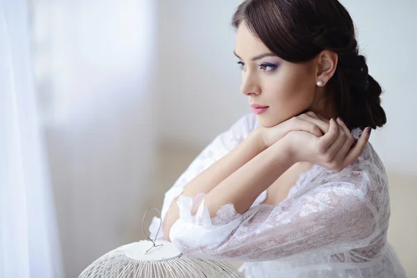 Beautiful woman in white lacy lingerie — Stock Photo, Image