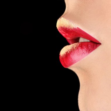 Painted golden female lips