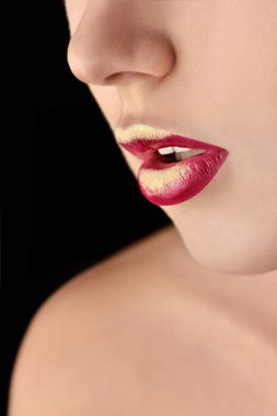Painted golden female lips