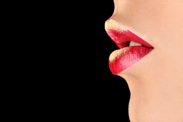 Bemalte goldene weibliche Lippen — Stockfoto