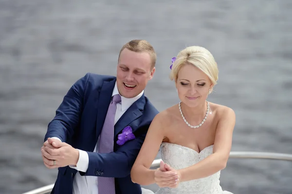 https://st2.depositphotos.com/7464162/10380/i/450/depositphotos_103805536-stock-photo-wedding-couple-on-yacht.jpg