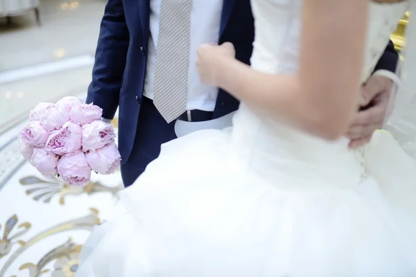 Beautiful wedding couple hugging