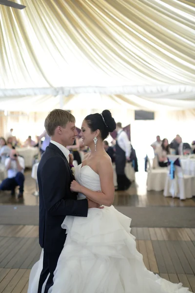 Wedding couple dancing in restaurant