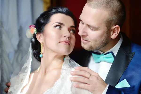 Beautiful wedding couple hugging — Stock Photo, Image