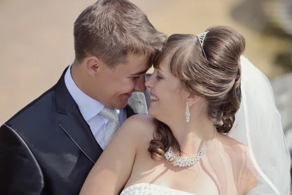 Beautiful wedding couple hugging — Stock Photo, Image