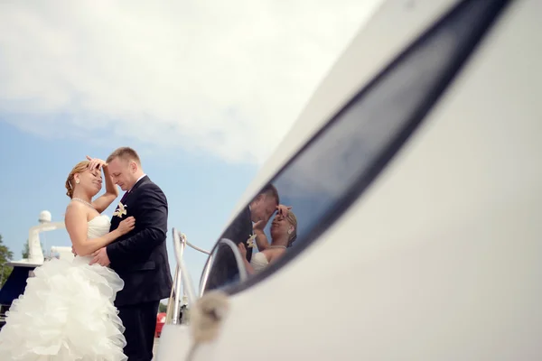 Wedding couple hugging on yacht Royalty Free Stock Photos