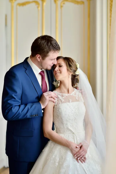 Beautiful wedding couple hugging — Stock Photo, Image