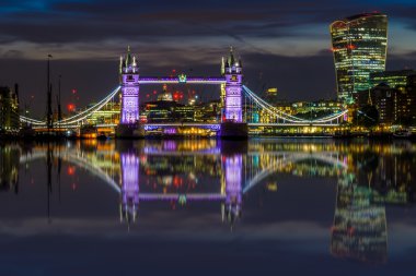 Illuminated London Cityscape During Sunset clipart