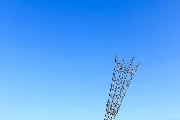Vzhůru nohama elektřiny Pylon v Greenwich — Stock fotografie