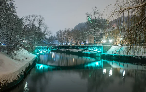 Ljubljanica river in snow, Ljubljana, Slovenia — Stock Photo, Image