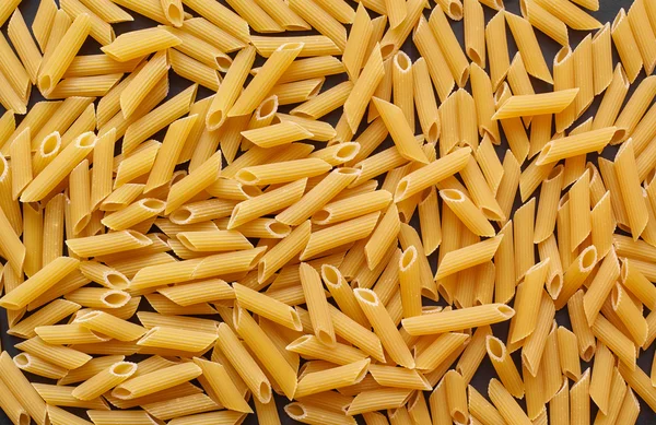 Texture of raw macaroni — Stock Photo, Image