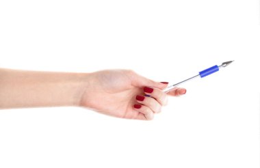 Female hands hold a pen isolated on white background
