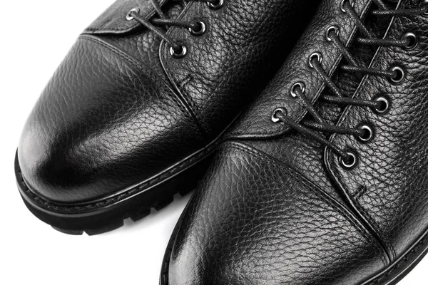 Men\'s fashion leather shoes for autumn, spring, European winter. Boots for a modern grunge woman. Women\'s black boots with laces isolated on white. Black Leather Army Boots. Autumn. Fashion. Style.