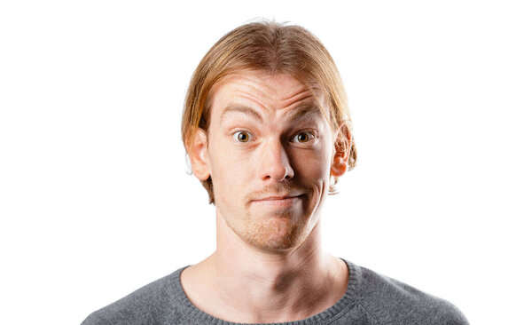 Male portrait of a fair-haired man of European appearance, on a white background. Emotions.