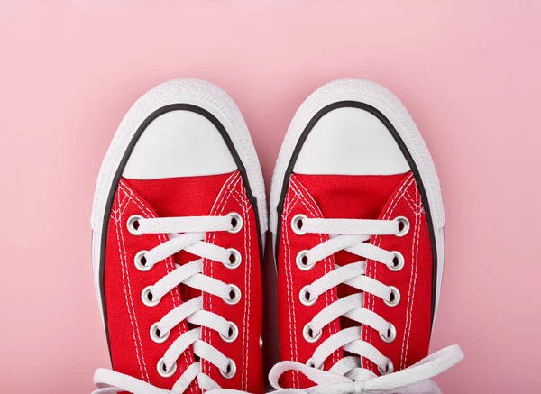 Red Sneakers Pink Background Copy Space Youth Shoes — Stock Photo, Image