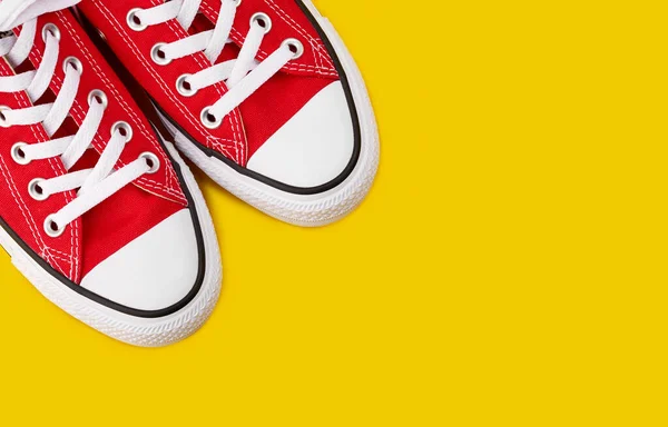 Red Sneakers Yellow Background Copy Space Youth Shoes — Stock Photo, Image