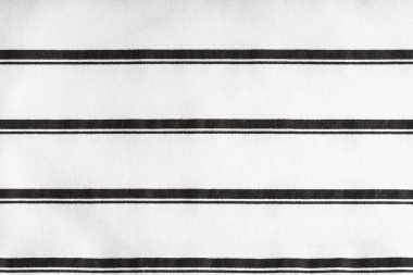 Siyah beyaz çizgili pamuk kumaş. Pamuk kumaşın dokusu.
