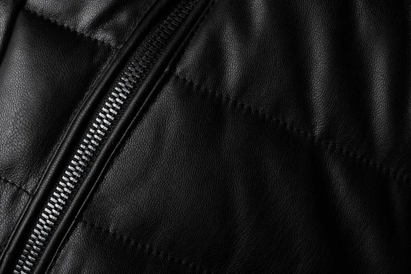 黒革の質感を背景として閉じます ジャケット革生地の質感 — ストック写真