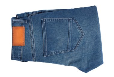 Denim kot desenli yırtık. Renkli pamuk kumaşın dokusu. Dikilmiş desenli kot pantolon. Moda pantolonu düğmesi. Kotun üzerindeki perçin ve cep. İplik ve kumaş yapısı.