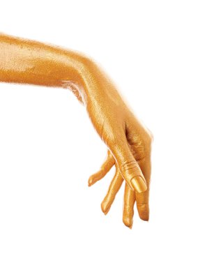 Altın boyalı eller. Altın parmaklar. Kadın eli beyaz arka planda izole edilmiş. Beyaz kadınların rahat elleri sembol ve jestler gösteriyor..