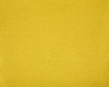 Sarı pamuklu kumaş. Kumaş dokusunu kapat. Pamuk kumaş dokusu. Kumaş Tekstil Yüzeyinin Üstten Görünümü. Sarı Giysi Arkaplanı. Metin Boşluğu. Tasarımcılar için soyut arkaplan ve doku.